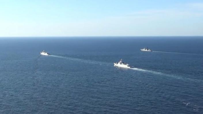 Russian and Chinese naval vessels conduct a maritime patrol in the Pacific Ocean