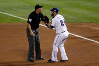 ARLINGTON, TX - OCTOBER 22: Mike Napoli #25 of the Texas Rangers argues a call with first base umpire Ron Kulpa after Matt Holliday #7 of the St. Louis Cardinals is called safe after a tag in the fourth inning during Game Three of the MLB World Series at Rangers Ballpark in Arlington on October 22, 2011 in Arlington, Texas. (Photo by Ezra Shaw/Getty Images)