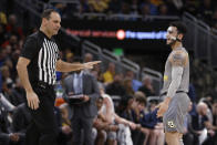 Marquette's Markus Howard reacts to a call during the first half of the team's NCAA college basketball game against Creighton on Tuesday, Feb. 18, 2020, in Milwaukee. (AP Photo/Aaron Gash)