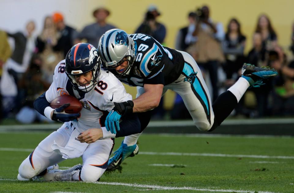 Denver Broncos’ Peyton Manning (18) is sacked by Carolina Panthers’ Luke Kuechly (59) during the first half of the NFL Super Bowl 50 football game Sunday, Feb. 7, 2016, in Santa Clara, Calif. Kuechly of St. Xavier is a 2021 member of the LaRosa's Hall of Fame.