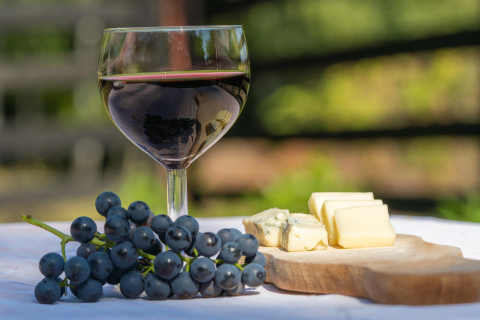 Cheese, grapes and red wine tasting