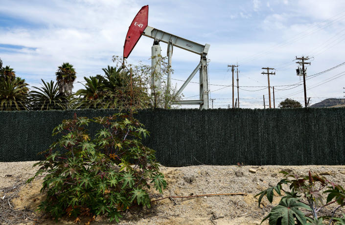 An oil pumpjack operates on August 5, 2022 near Ventura, California