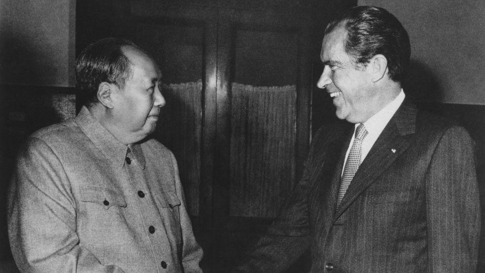 In this February 21, 1972, file photo, Chinese communist party leader Mao Zedong, left, and US President Richard Nixon shake hands as they meet in Beijing. - AP