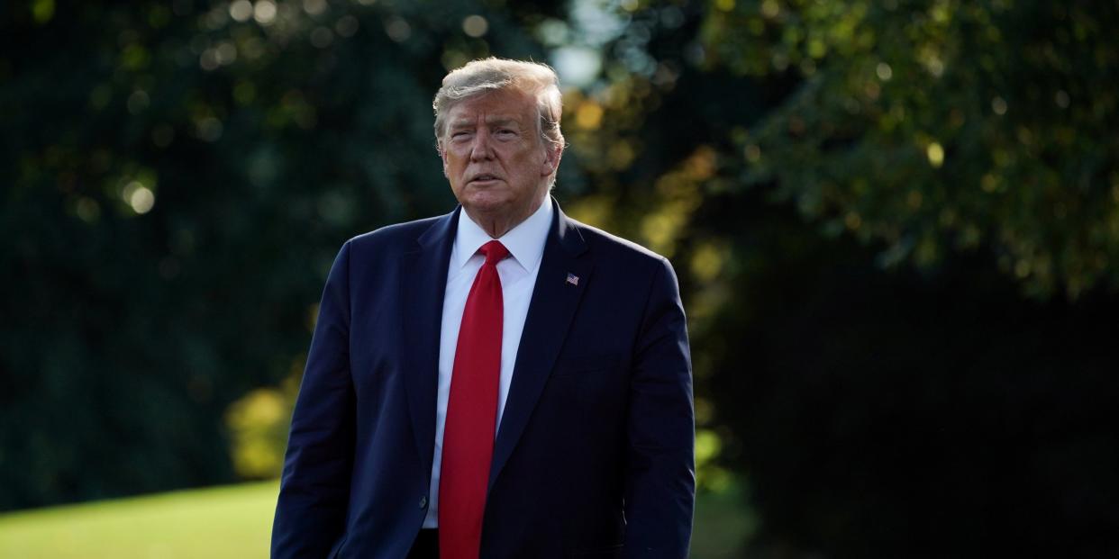 FILE PHOTO: U.S. President Donald Trump walks to address the media before boarding Marine One for a trip to New Mexico, on the South Lawn of the White House in Washington, U.S., September 16, 2019. REUTERS/Sarah Silbiger.