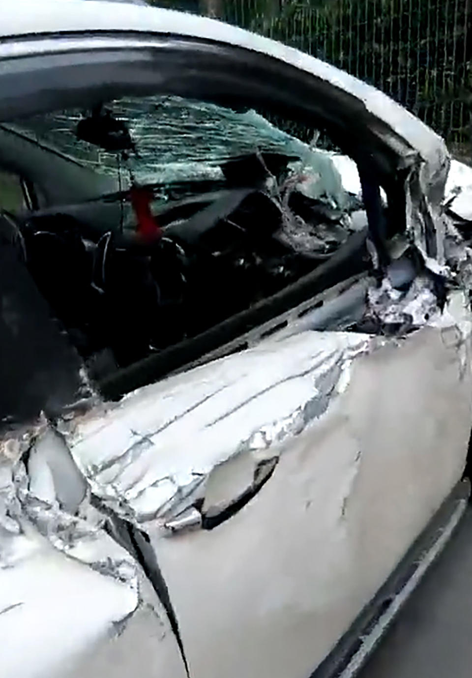 Lucky escape: The car was virtually written off after the freak smash. (AsiaWire)