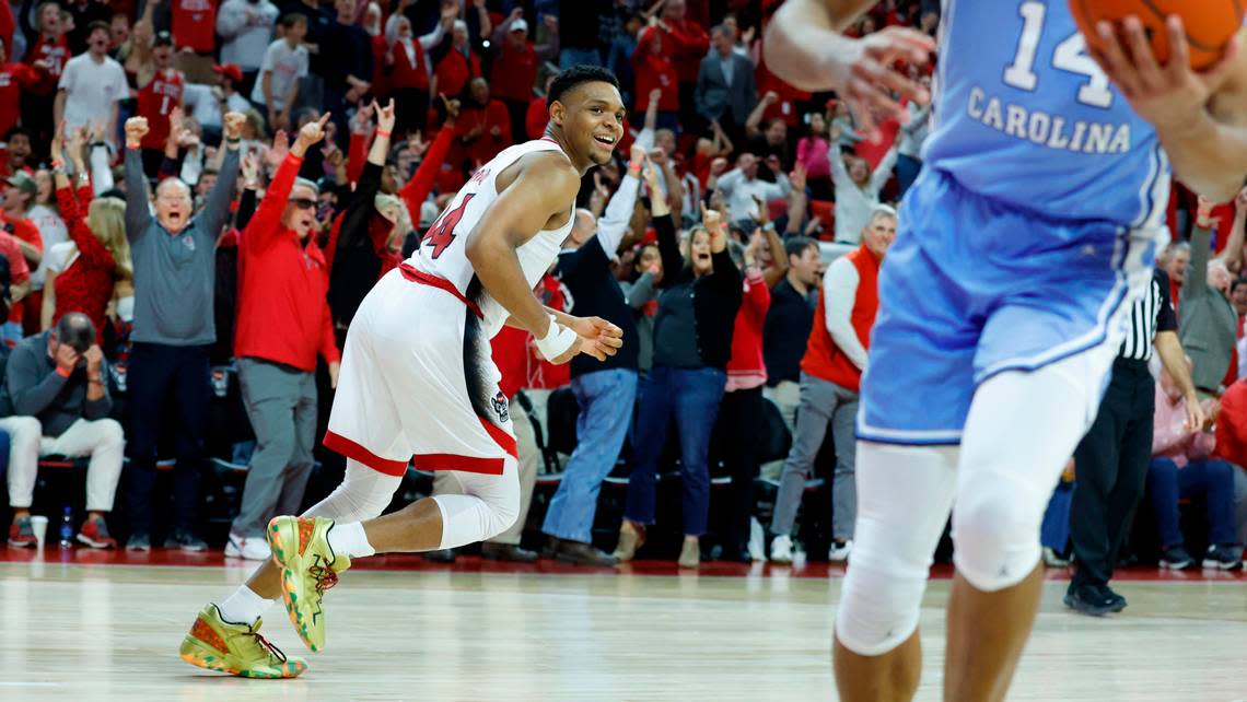 N.C. State’s Casey Morsell (14) heads back upcourt after making the basket in the second half of N.C. State’s 77-69 victory over UNC at PNC Arena in Raleigh, N.C., Sunday, Feb. 19, 2023.