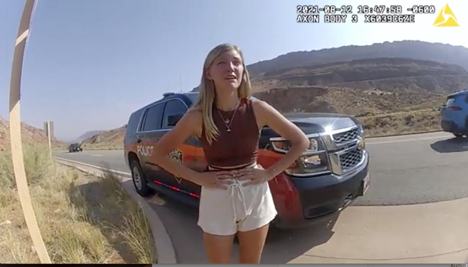 FILE - In this image taken from police body camera video provided by the Moab Police Department, Gabrielle "Gabby" Petito talks to a police officer after police pulled over the van she was traveling in with her boyfriend, Brian Laundrie, near the entrance to Arches National Park on Aug. 12, 2021. A letter written by Roberta Laundrie to her late son Brian Laundrie can be used by the attorney for Petito’s parents in preparation for their negligence lawsuit filed against Laundrie’s parents and their New York-based attorney in their high-profile case involving Petito’s death. (Moab Police Department via AP, File)