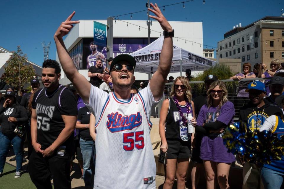 Zach Justice, of Sacramento, cheers as the crowd gets ready to enter Golden 1 Center for Game 7 of the first-round NBA playoff series between the Sacramento Kings and the Golden State Warriors on Sunday, April 30, 2023. “We’ve been waiting for this since I was 9-years-old!” Justice shouted.