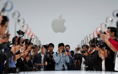 Fans, bloggers and journalists get their first look at the new handsets - Credit: Stephen Lam/Reuters