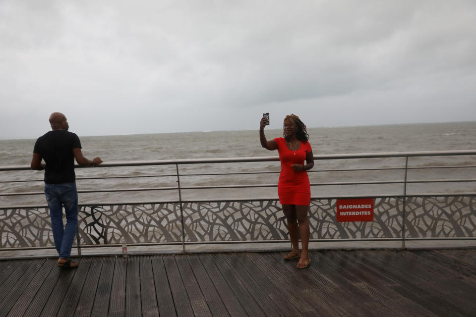 <p>A woman takes a selfie as Hurricane Maria approaches in Petit-Bourg, Guadeloupe island, France, Sept. 18, 2017. (Photo: Andres Martinez Casares/Reuters) </p>