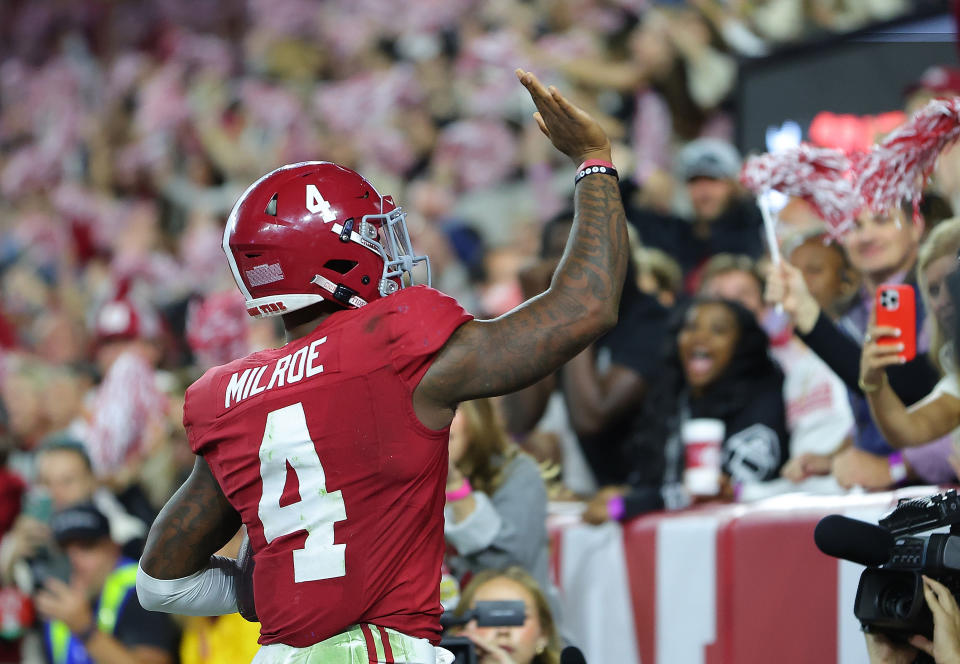 TUSCALOOSA, ALABAMA - NOVEMBER 04:  Jalen Milroe #4 of the Alabama Crimson Tide reacts after rushing for a touchdown against the LSU Tigers during the third quarter at Bryant-Denny Stadium on November 04, 2023 in Tuscaloosa, Alabama.  (Photo by Kevin C. Cox/Getty Images)