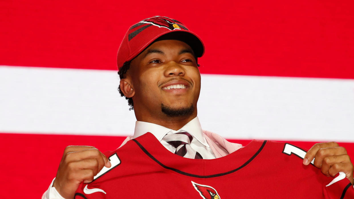 Mandatory Credit: Photo by Jeff Haynes/AP/Shutterstock (10218831fp)Oklahoma quarterback Kyler Murray poses with his new team jersey after the Arizona Cardinals selected Murray in the first round at the NFL football draft, in Nashville, TennNFL Draft Football, Nashville, USA - 25 Apr 2019.