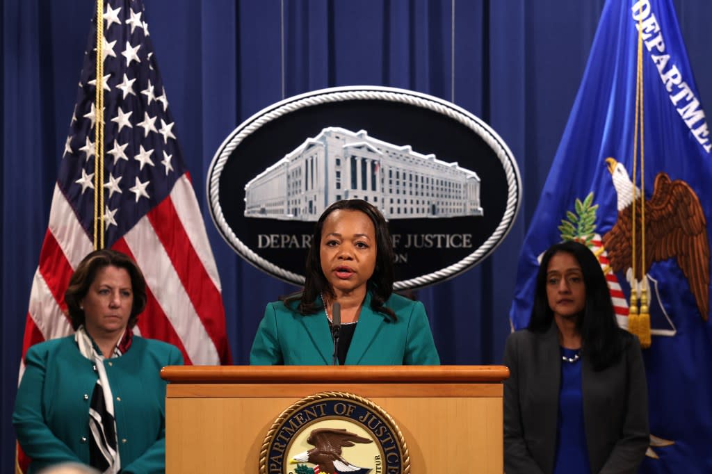 Kristen Clarke (center), assistant attorney general for the Department of Justice’s Civil Rights Division, speaks at a news conference in 2021 to announce that the department would be suing the state of Georgia over its new election laws. (Photo by Anna Moneymaker/Getty Images)