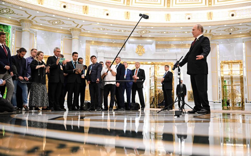 Vladimir Putin, the Russian President, speaks to the media in Ashgabat yesterday - Dmitry Azarov/AFP