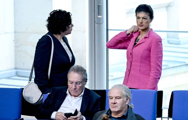 Members of the German Bundestag Amira Mohamed Ali (L) and Sahra Wagenknecht take part in a plenary session to discuss the 2024 federal budget. Britta Pedersen/dpa