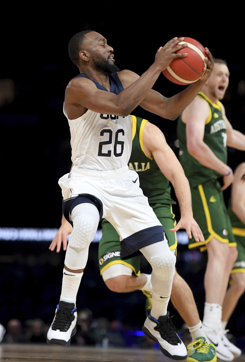 United States' Kemba Walker attempts a shot during their exhibition basketball game against Australia in Melbourne, Thursday, Aug. 22, 2019. (AP Photo/Andy Brownbill)
