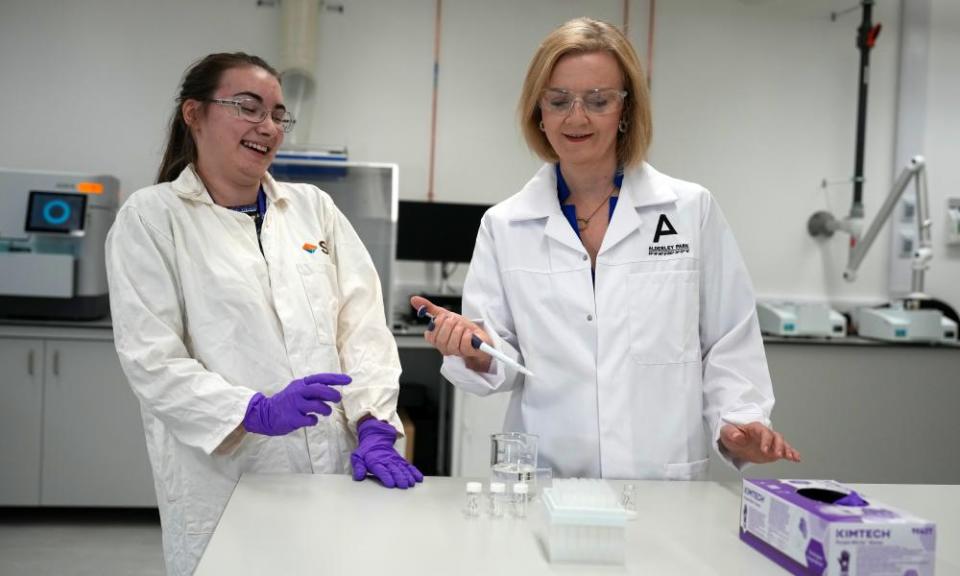 Liz Truss, right, at a life sciences lab in Manchester.