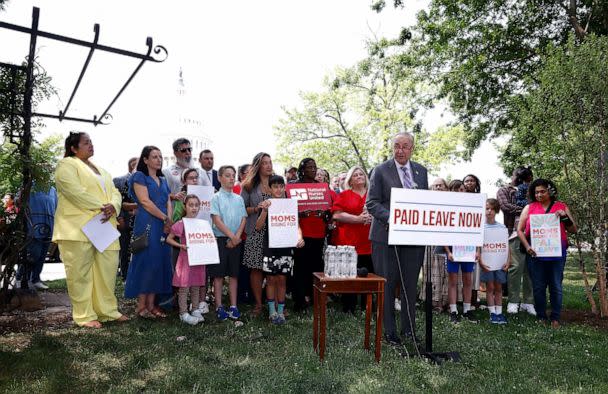 PHOTO: Senate Majority Leader Chuck Schumer joins MomsRising members and their kids at a picnic on Capitol Hill to urge Congress to make child care affordable, pass paid leave and support care infrastructure, May 17, 2023 in Washington. (Paul Morigi/Getty Images for MomsRising)