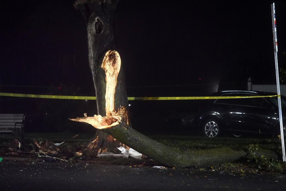 The scene where two people were reportedly killed after a vehicle crashed into a tree on Teaneck Road near Hamilton Road in Teaneck, NJ around 2:45 a.m. on October 21, 2023.