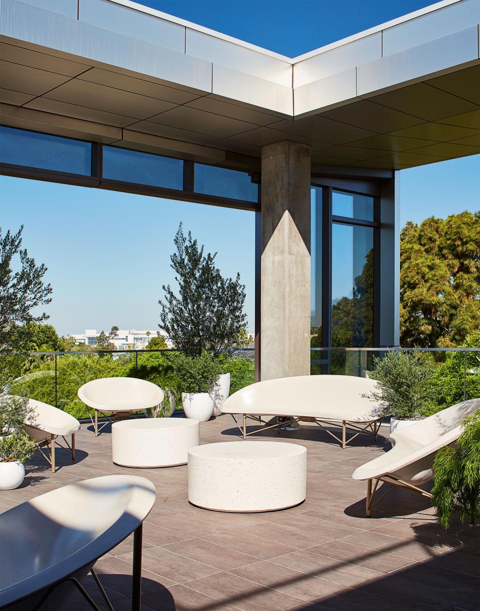 Heated outdoor furniture by Galanter & Jones allows year-round enjoyment of the terrace.