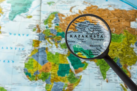 A map with Kazakhstan highlighted with a magnifying glass