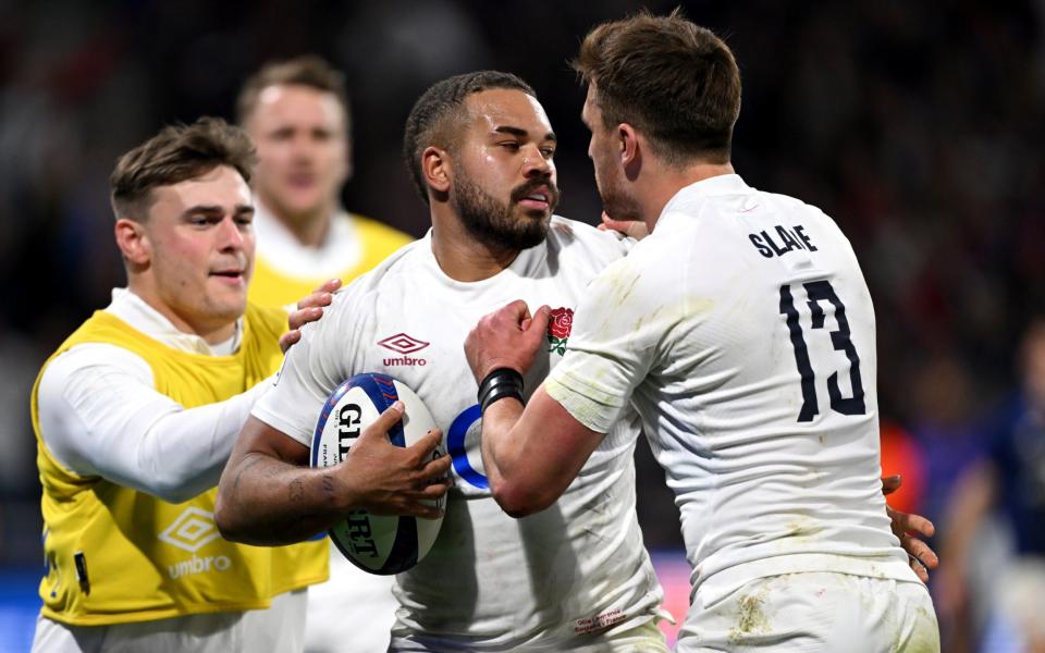 Ollie Lawrence of England celebrates scoring his team's first try against France