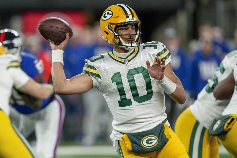 Green Bay Packers quarterback Jordan Love (10) passes against the New York Giants during the first quarter of an NFL football game, Monday, Dec. 11, 2023, in East Rutherford, N.J. (AP Photo/Seth Wenig)