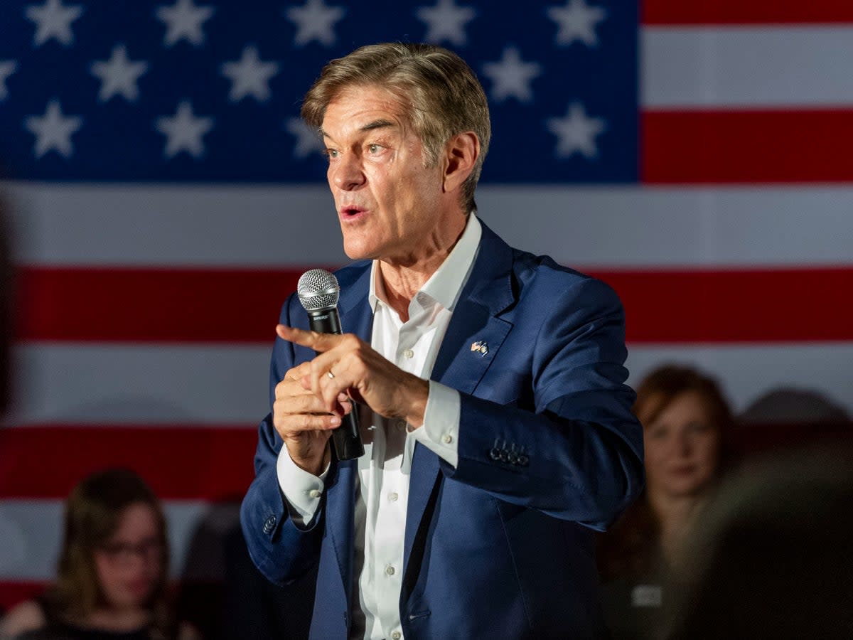 Dr Mehmet Oz campaigning in Pennsylvania (AP)