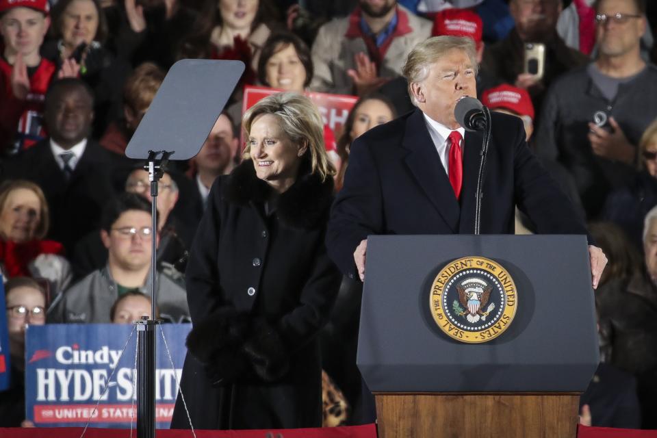 Sen. Cindy Hyde-Smith and President Donald Trump during a rally at the Tupelo Regional Airport, Nov. 26, 2018.