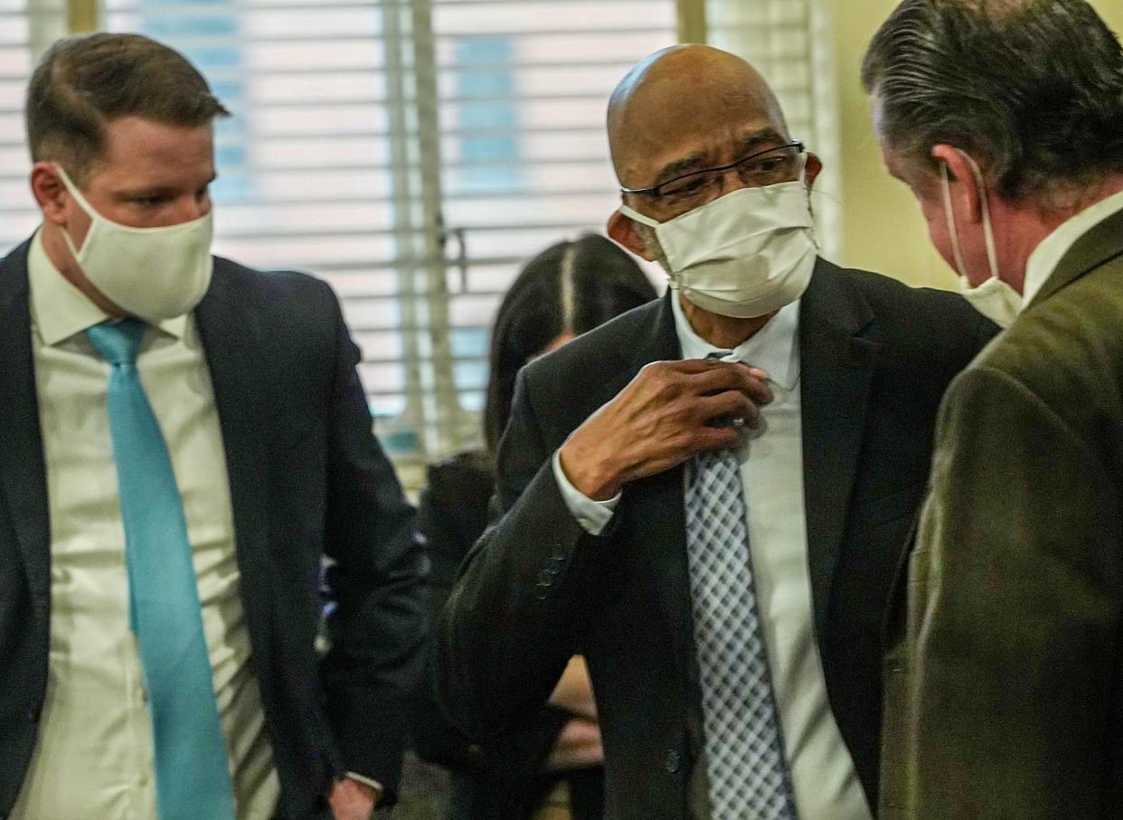 Elwood Jones, center, at a bond hearing Friday in Hamilton County Court. Judge Wende Cross, who set his bond Friday, ordered a new trial for Jones last month after concluding prosecutors withheld crucial evidence in his original trial.