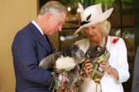 <p>In Australia as part of their royal tour, Camilla and Charles held koalas, who seemed to be snuggling.</p>