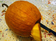 <body> <p>After meticulously carving a pumpkin, you’re always eager to bring your masterpiece to radiant life by placing a candle inside. But sticking a lit flame through the top of a jack-o'-lantern is no easy feat, and one wrong move can result in burnt fingers—<em>ouch!</em> The solution is surprisingly simple: Cut out the <em>bottom</em> of your pumpkin instead of the top. <a rel="nofollow noopener" href=" http://www.bobvila.com/slideshow/14-new-uses-for-old-candles-49805?bv=yahoo" target="_blank" data-ylk="slk:Set a lit candle;elm:context_link;itc:0;sec:content-canvas" class="link ">Set a lit candle</a> atop the carved-out base, place the hollow gourd over the flame, and you'll never again have to struggle with a match or lighter on Halloween night. </p> <p><strong>Related: <a rel="nofollow noopener" href=" http://www.bobvila.com/slideshow/30-easy-painted-pumpkins-to-perk-up-your-halloween-46315/?bv=yahoo" target="_blank" data-ylk="slk:30 Easy Painted Pumpkins to Perk Up Your Halloween;elm:context_link;itc:0;sec:content-canvas" class="link ">30 Easy Painted Pumpkins to Perk Up Your Halloween</a> </strong> </p> </body>