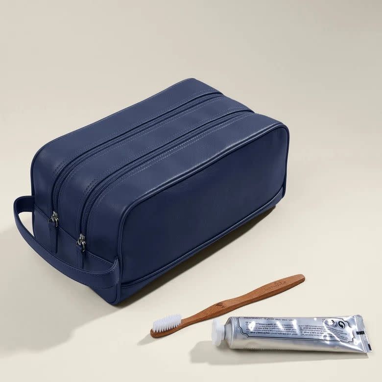 <p><a href="https://go.redirectingat.com?id=74968X1596630&url=https%3A%2F%2Fwww.leatherology.com%2Fdouble-zip-toiletry-bag%3Fcolor%3Dnavy-blue%26style%3D602&sref=https%3A%2F%2Fwww.veranda.com%2Fshopping%2Fg60747281%2Fbest-golf-gifts-for-men%2F" rel="nofollow noopener" target="_blank" data-ylk="slk:Shop Now;elm:context_link;itc:0;sec:content-canvas" class="link ">Shop Now</a></p><p>Double Zip Toiletry Bag</p><p>leatherology.com</p><p>$140.00</p>