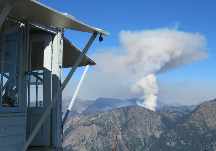 A plume of smoke is visible from the door of the lookout. <span>(Photo: Jim Henterly )</span>