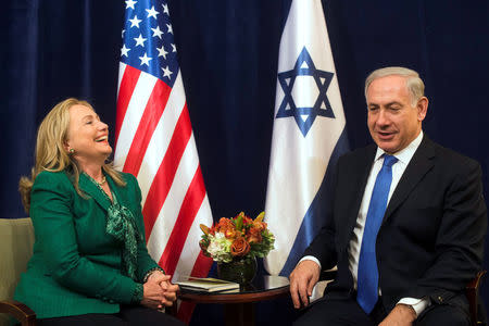 U.S. Secretary of State Hillary Clinton meets with Israeli Prime Minister Benjamin Netanyahu (R) during an offsite bilateral meeting as part of the 67th United Nations General Assembly in New York, September 27, 2012. REUTERS/Keith Bedford/File Photo