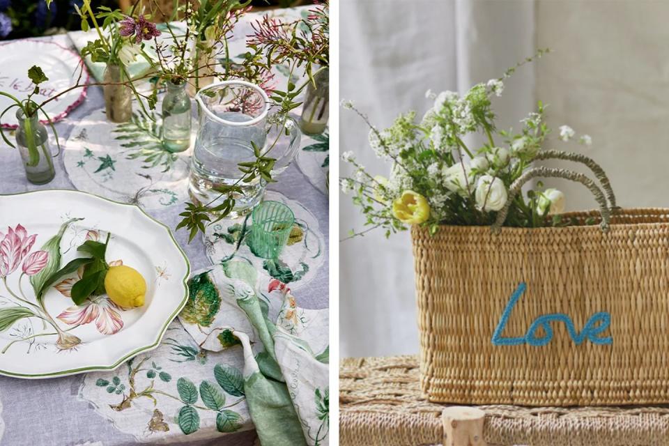 a table full of plates and a basket of flowers