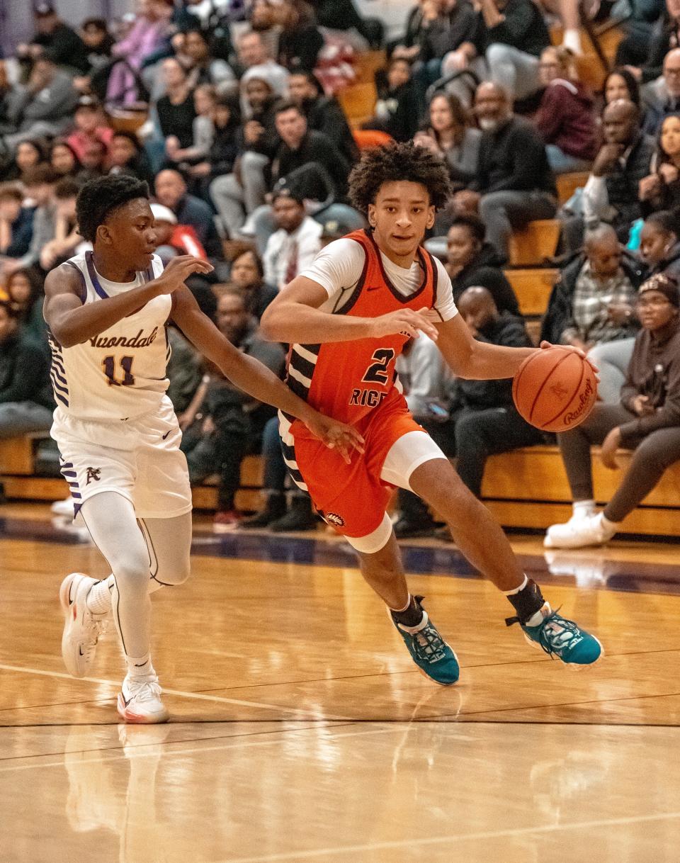 Brother Rice's Elijah Williams attacks the basket during a boys basketball game on Saturday, Dec. 9, 2023, at Auburn Hills Avondale.