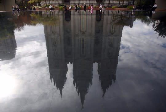 The Salt Lake Temple is reflected in a pool during the biannual general conference of The Church of Jesus Christ of Latter-day Saints in Salt Lake City, Utah October 3, 2015. (Photo: REUTERS/Jim Urquhart)