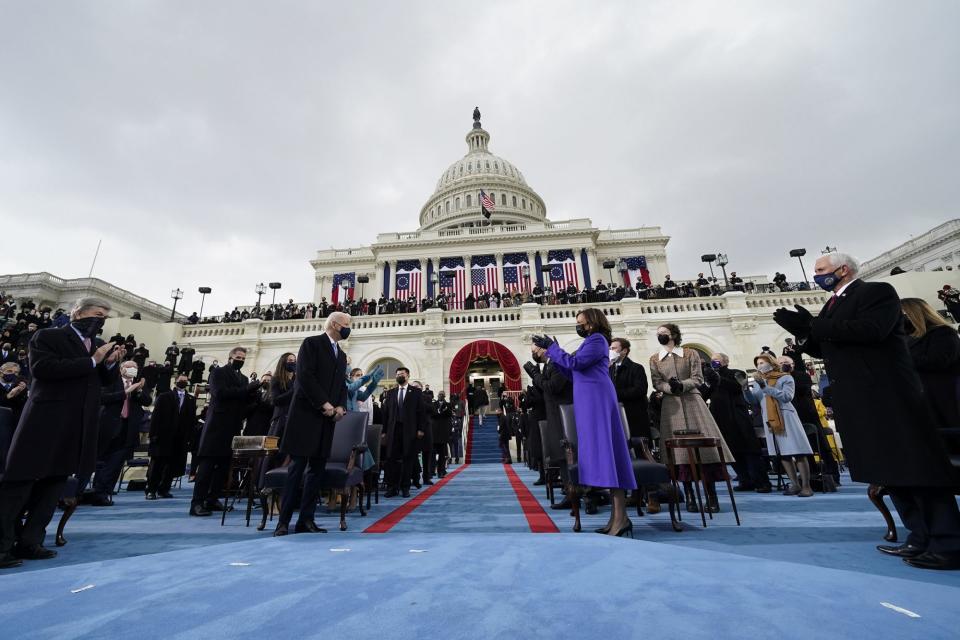 <p>The crowd applauds as President-elect Joe Biden arrives at the U.S. Capitol. </p>