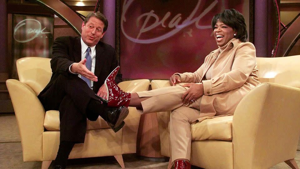 Al Gore talks with Oprah Winfrey on her show in 2000. - Luke Frazza/AFP/Getty Images