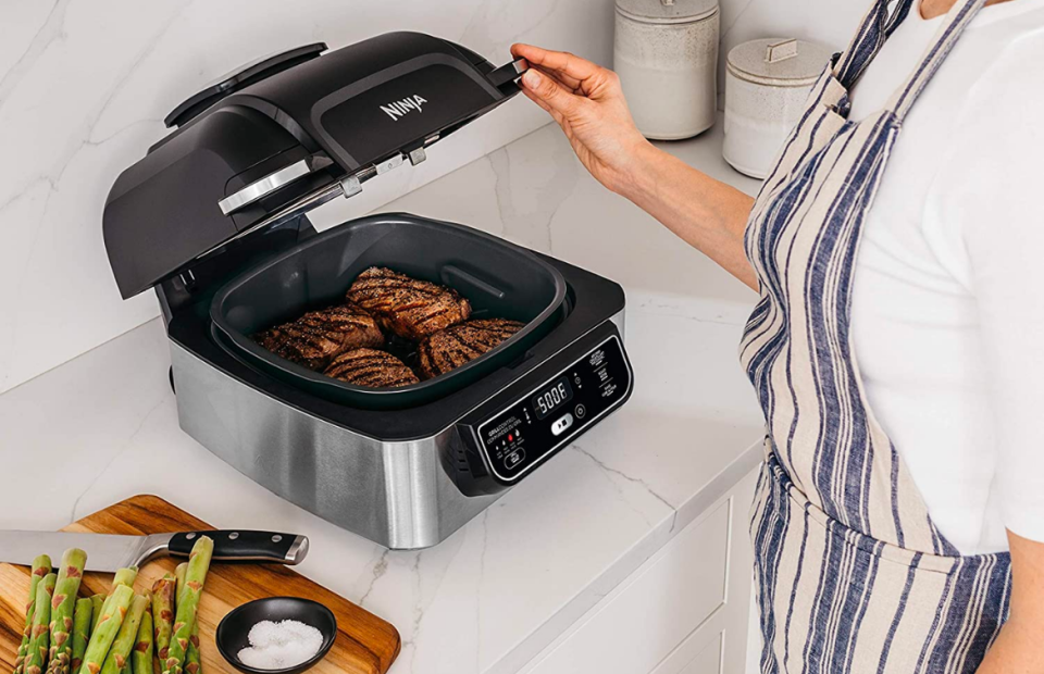 Save 21% on the Ninja Foodi 4-in-1 Indoor Grill with 4-Quart Air Fryer. Image via Amazon.