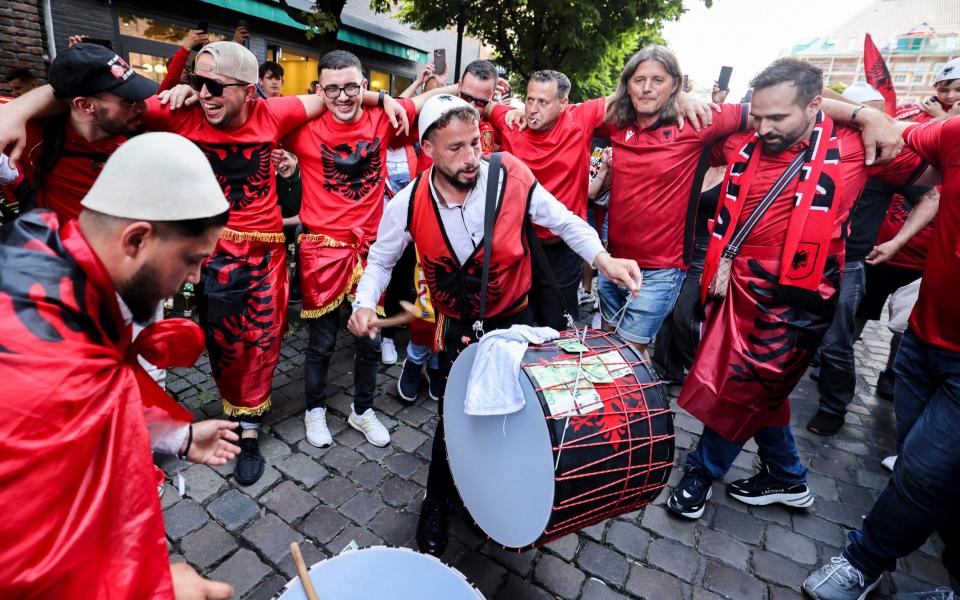 Albania fans with a drum