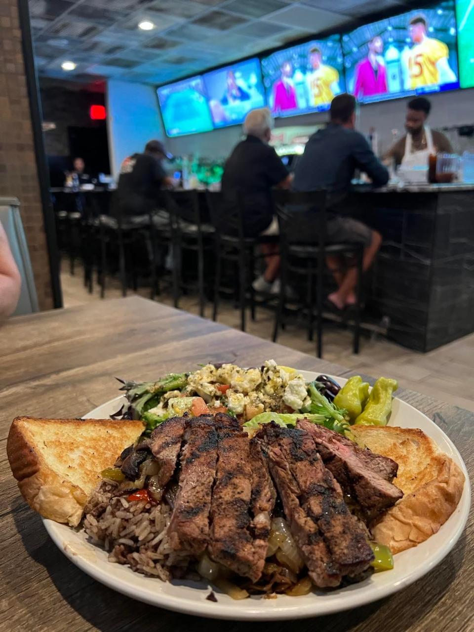 The Mediterranean platter at the new Loby's Grille on CLE in Canton stands out among the sports bar staples of the restaurant.