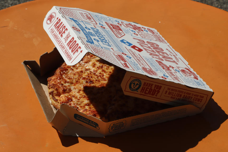 This is a small Domino's pizza made in a Domino's Pizza shop in downtown Pittsburgh Monday, July 15, 2019. (AP Photo/Gene J. Puskar)