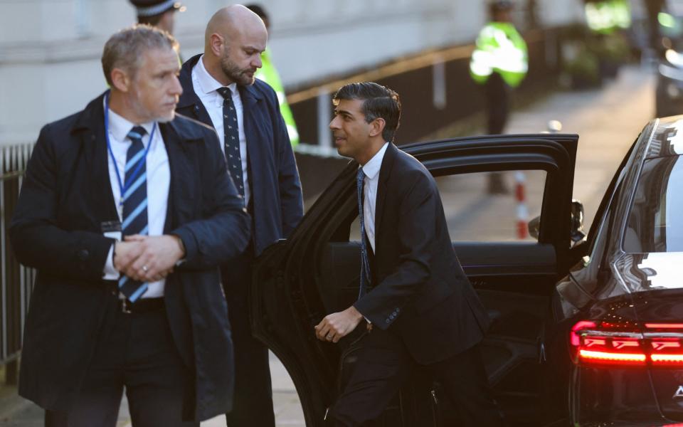 British Prime Minister Rishi Sunak steps out of a car on the day he attends the UK Covid-19 inquiry
