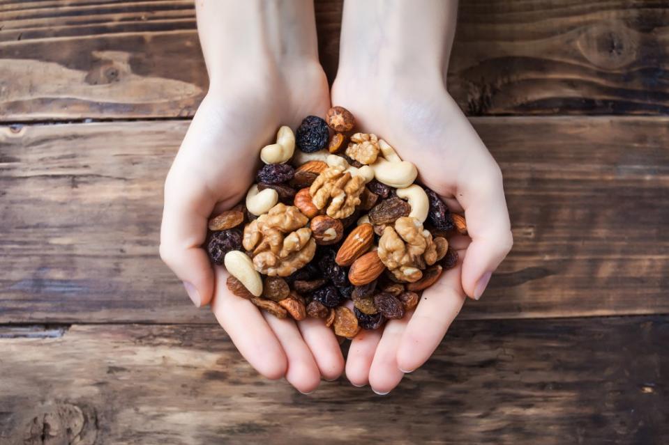 “Trail mix has a history of good intentions, but many of the trail mixes sold commercially contain candy, chocolate, sweetened nuts, or a great deal of dried fruit, so the serving size is much less than we’d want to consume,” Smith says. Aleksej – stock.adobe.com