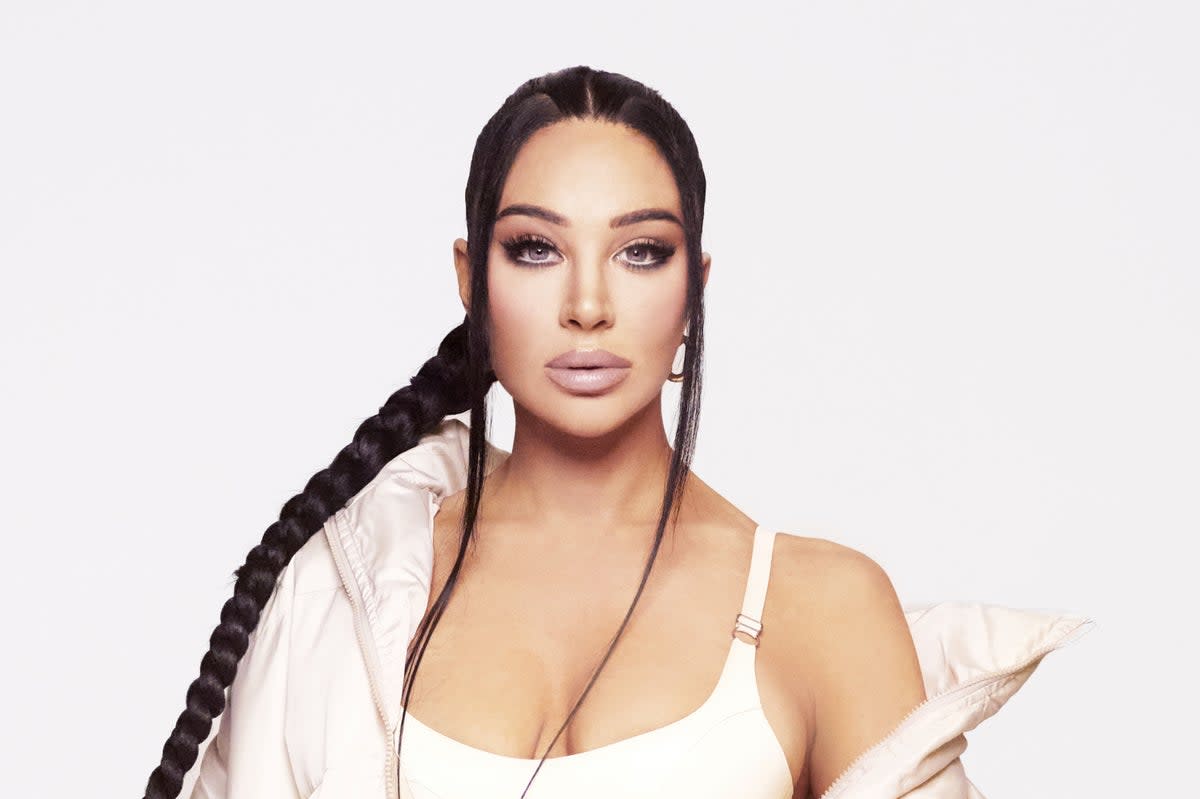 N-Dubz member Tulisa says the hip-hop trio are here to stay  (Handout)