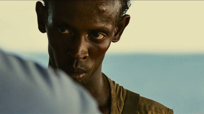 Abdi glaring at Tom Hanks in the film