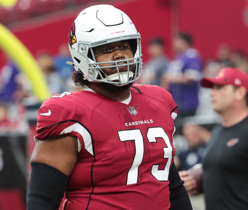 Cardinals offensive guard Max Garcia warms up before playing against the Vikings on Sept. 19.