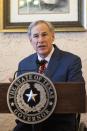 Texas Governor Greg Abbott delivers an announcement in Montelongo's Mexican Restaurant on Tuesday, March 2, 2021, in Lubbock, Texas. Abbott announced that he is rescinding executive orders that limit capacities for businesses and the state wide mask mandate. (AP Photo/Justin Rex)
